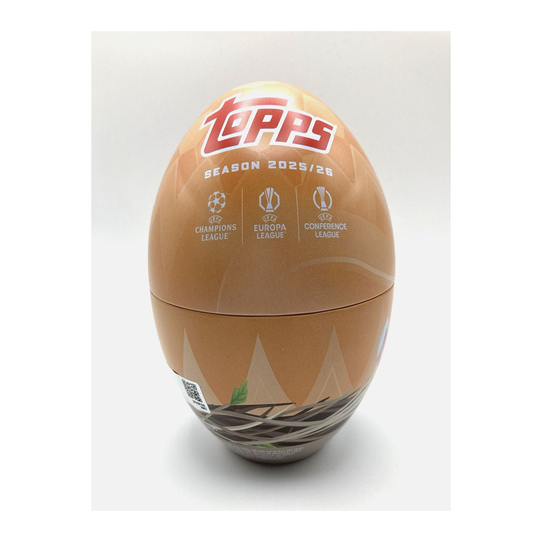 Collect the biggest stars of European club soccer with the 2025-26 Topps UEFA Club Competitions Soccer Easter Tin. This special edition tin features premium trading cards showcasing players from the continent's most prestigious competitions. Perfect for collectors and fans alike, each tin delivers an exciting mix of base cards and special inserts. Limited Easter release makes this a must-have for serious card enthusiasts. Build your collection of elite European talent today.