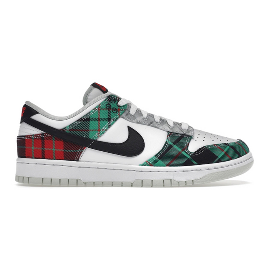 Make a statement with the Nike Dunk Low Tartan Plaid! With its bright tartan plaid design, this stylish sneaker will add a bold and daring look to your wardrobe. Designed with comfort and durability in mind, the Nike Dunk Low is sure to be the perfect addition to your streetwear collection. Experience swagger and style today!