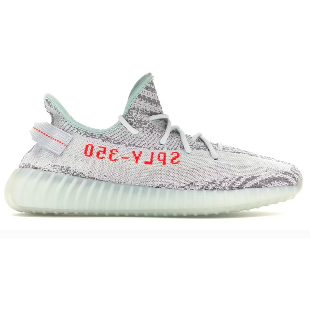 Discover unparalleled street style with the Yeezy Boost 350 v2 Blue Tint. Boasting sleek comfort and fashionable design, these shoes combine style and function in a way that will keep you looking fresh no matter the occasion. Experience streetwear in a whole new way - get the Yeezy Boost 350 v2 Blue Tint today!