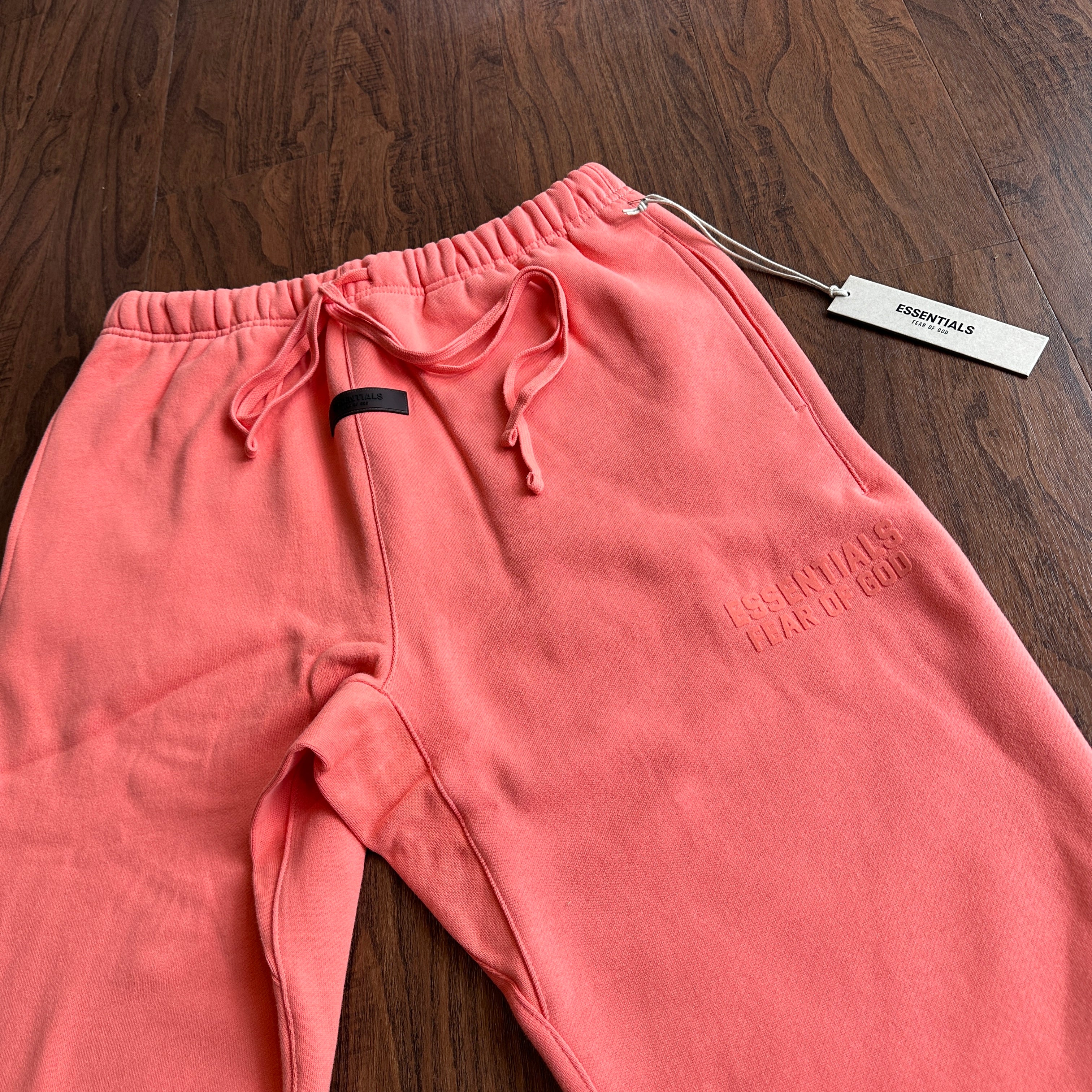 Pink essentials sweatpants hotsell