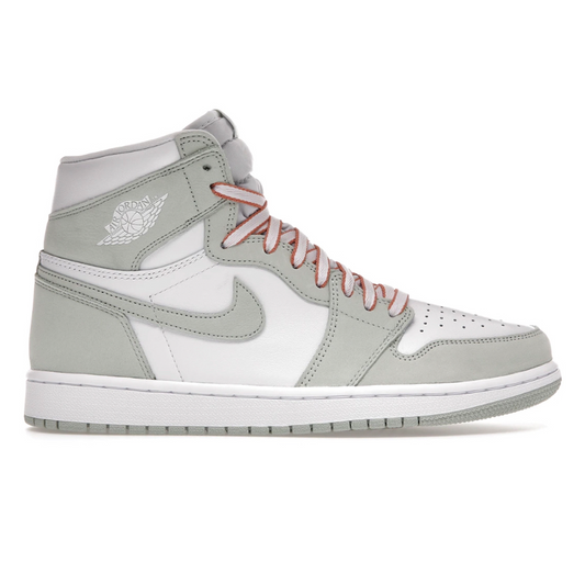 Discover the legendary style of Nike Air Jordan 1 High Retro Seafoam (Womens). These sneakers boast timeless design and superior comfort thanks to Nike's Air technology. The seafoam green color adds an eye-catching touch of style. Step out in confidence with Nike Air Jordan Retro sneakers.