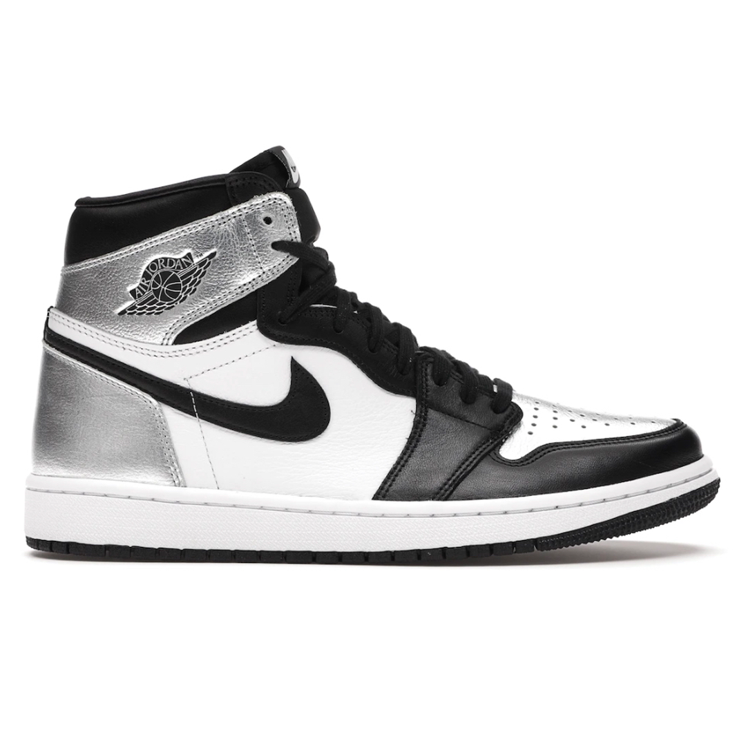 Make a statement with the Nike Air Jordan 1 Retro Silver Toe. This stylish sneaker features a luxurious silver toe and iconic Nike accents that command attention. Comfort and style meet durability for a stunning shoe perfect for everyday wear.