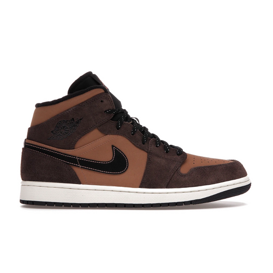 The Nike Air Jordan 1 Mid Chocolate (Youth) is the perfect combination of style and comfort. Featuring Nike's signature air cushioning, this mid-top shoe provides extra ankle support and superior cushioning, while the sleek chocolate design is sure to turn heads. Get your little one ready to make a statement with the Nike Air Jordan 1 Mid Chocolate (Youth)!