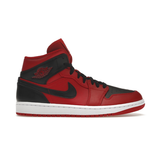 Let your kid take on the court in style with the Nike Air Jordan 1 Mid Reverse Bred (Youth)! These iconic sneakers combine trendy style and comfort, so your little one can look their best whether they’re mastering their basketball drills or just hanging out with friends. Get 'em looking and feeling great with the Air Jordan 1!