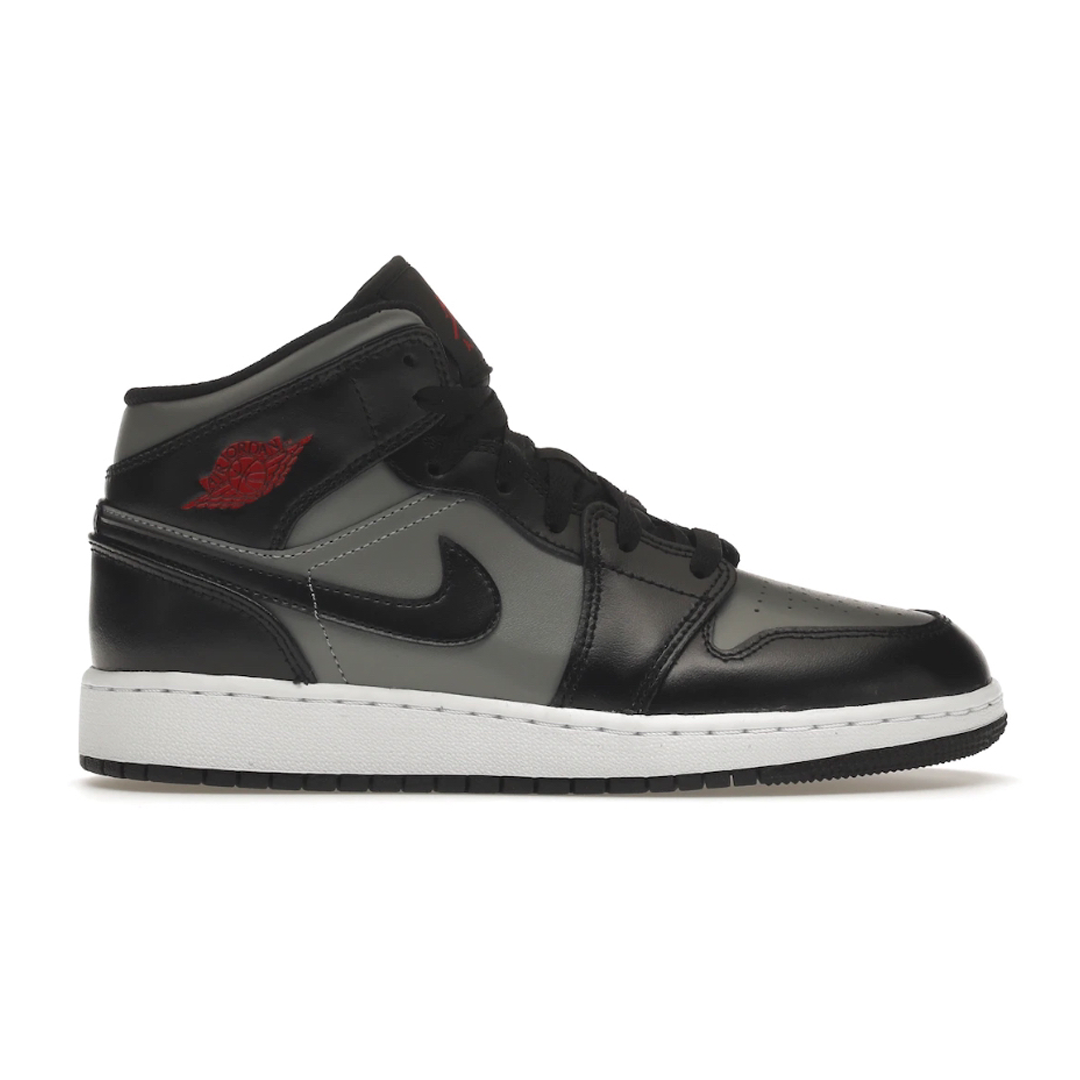 This Nike Air Jordan 1 Mid Shadow (Youth) is perfect for young athletes looking to take their performance to the next level. Its lightweight construction and comfortable cushioning are sure to keep kids cool and fast on their feet. Plus, its sleek, modern design is stylish enough for any occasion. Get your kids geared up for success with this must-have sneaker.