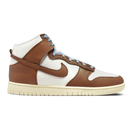 Step out in style with the Nike Dunk High Pecan. This great fall shoe boasts a classic look with its brown and cream outsole and baby blue laces. Experience the confidence and comfort of the Dunk High Pecan – make it your go-to this season!