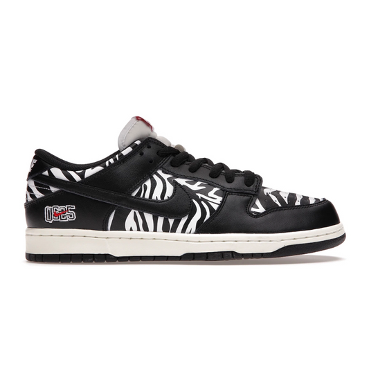 Introducing Nike's premium Dunk Low Quartersnacks Zebra for men - a stylish, lightweight sneaker that provides superior comfort and a unique, eye-catching design. With a cushioned midsole for responsive foot support and bold black and white zebra stripes, you won't want to miss out on this one-of-a-kind look. Step into the future with Nike!