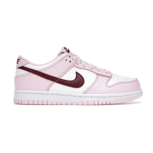 Feel the energy of the world’s greatest basketball court in this Nike Dunk Low Pink Foam Red White (Youth) sneaker! This lightweight, breathable design features a cushioning midsole to ensure all-day comfort. Ready to dominate the court? Get your game on with these stylish sneakers!