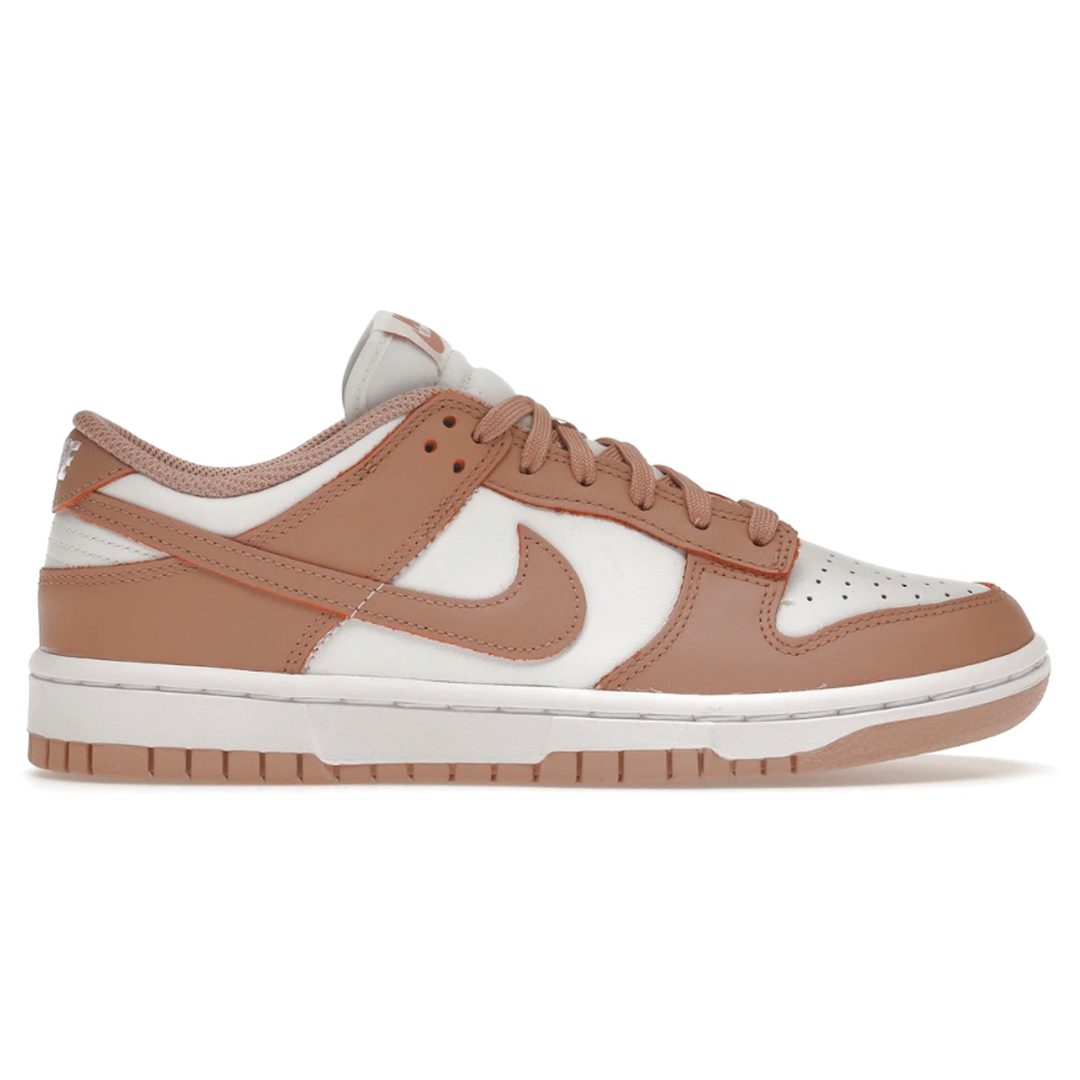 Take your style to the next level with the Nike Dunk Low Rose Whisper (Womens). These stunning shoes feature an eye-catching rose design and whisper colorway, making them the perfect combination of style and comfort. Let these shoes take your wardrobe to the next level!