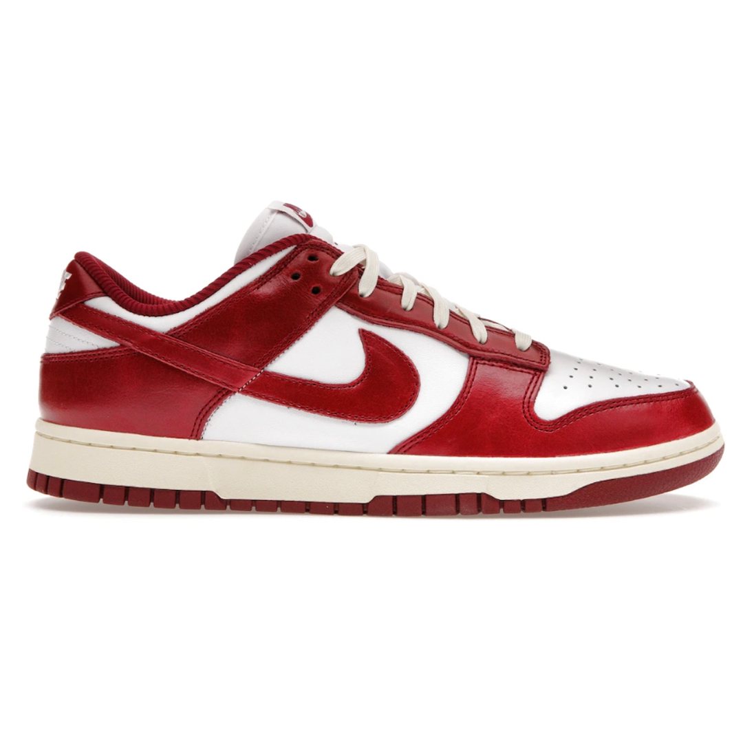 Be the envy of your friends in the Nike Dunk Low Vintage Team Red. The classic design and iconic style provides you with a unique, iconic look that will draw admiration. Comfort and style combine to make a shoe that will be your go-to all season.
