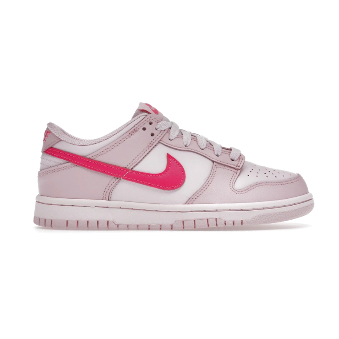 Make a statement with the Nike Dunk Low Triple Pink (Youth)! This classic sneaker features a pink themed upper for a bold, vibrant look that will turn heads. The lightweight design allows for maximum breathability and comfort - a perfect fit for any lifestyle!