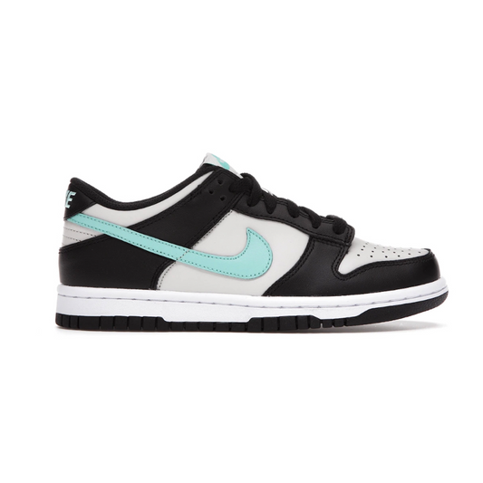 Gear up the kids with this stylish, comfortable Nike Dunk Low! The Tropical Twist Light Bone features a trendy design and soft cushioning for comfort on the court and elsewhere. Have them looking and feeling their best with this must-have shoe!