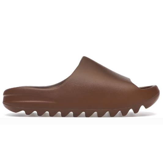 The Yeezy Slide Flax offers comfort, style, and a unique look for any outfit. Enjoy the infamously soft cushioning of Yeezys, while earning compliments with its eye-catching aesthetics. Strut confidently wherever you go with the Yeezy Slide Flax!