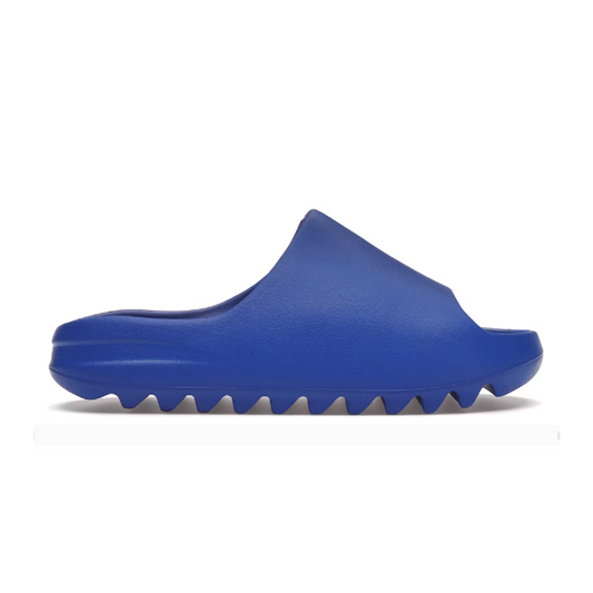 Step out in ultimate comfort and style with the Yeezy Slide Azure. Made from premium materials, this unique streetwear style is the perfect accessory to rock any casual look. Enjoy the comfort of a slim fit with a soft footbed for all-day comfort. Make a statement wherever you go!